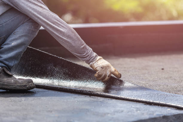 Professional Waterproofing technician working in Hancock, MD